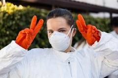 Students suited up to go through trash