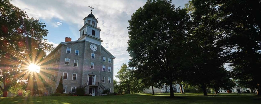 Middlebury Chaple with sun setting in background.